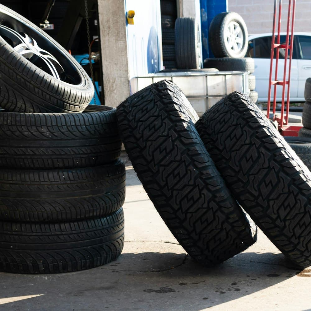 Stacked car tyres